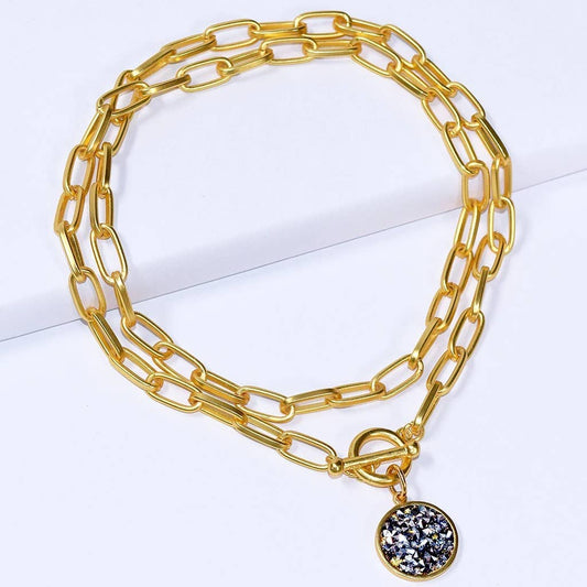 Elongated link chain necklace with crystal cluster charm